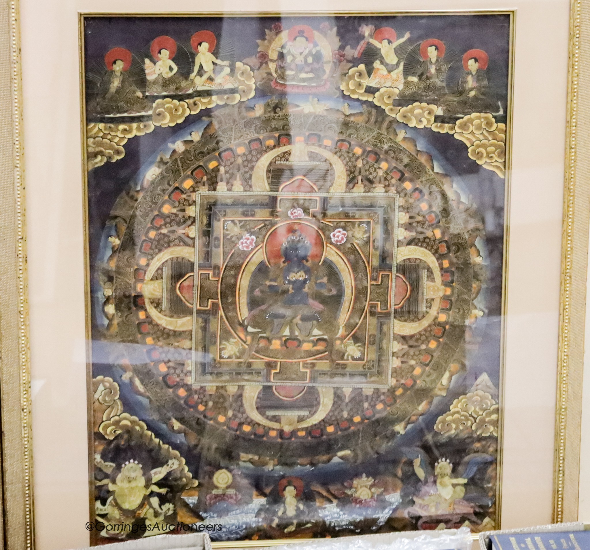 A framed and glazed Tibetan Mandala thangka, 71 x 51cm